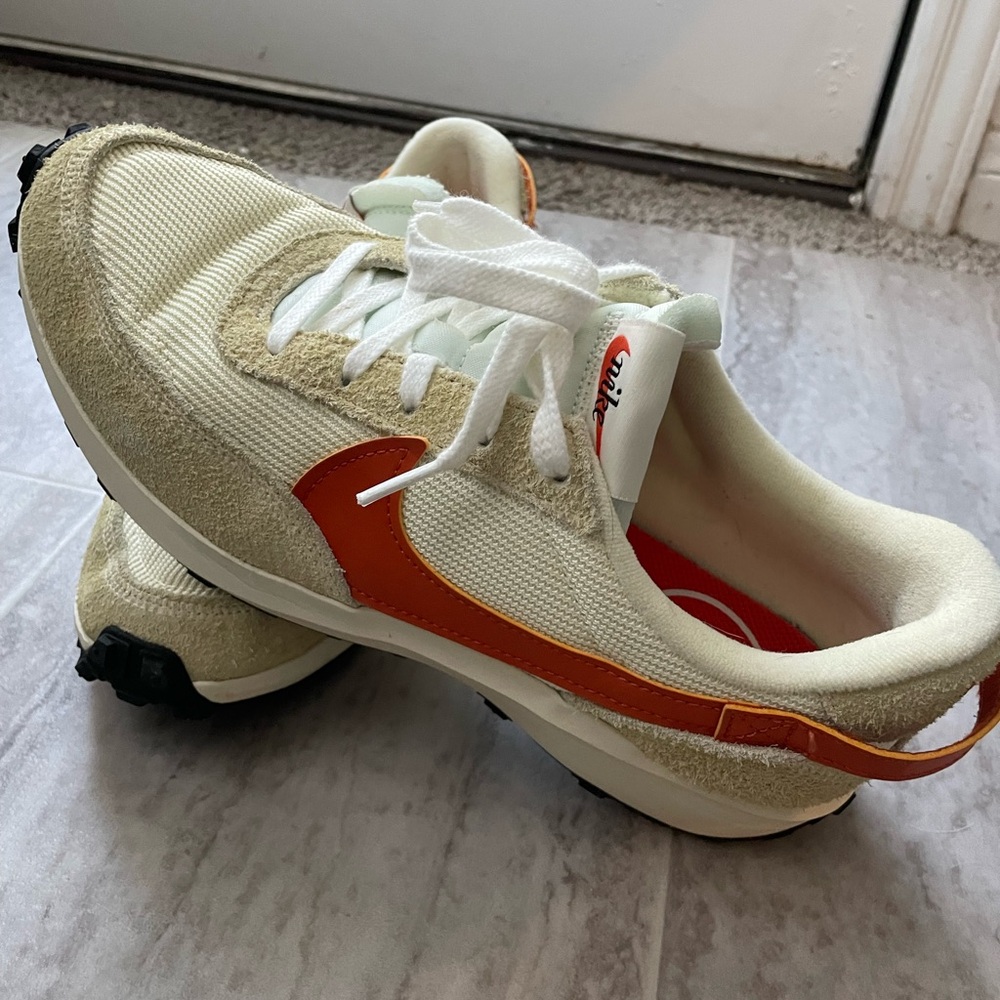 Nike Sneakers with Orange and Cream Accents